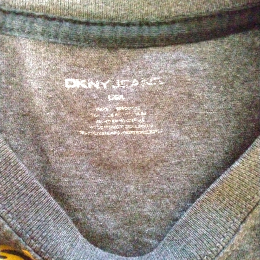 DKNY Jeans shirt with graphic design over argyle